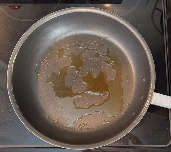 Heat the dry pan 2 minutes on medium-high, then add a tablespoon of olive oil.