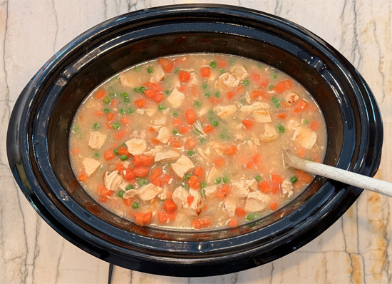 Add the frozen peas and carrots, cover and cook for another 30 minutes. 