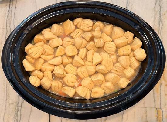Placed the baked dough in the slow cooker and cook for one more hour. 