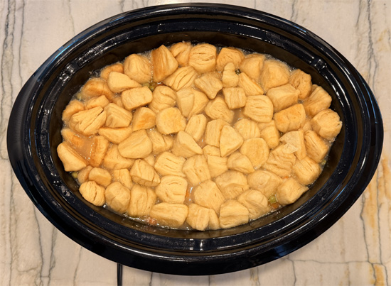 Placed the baked dough in the slow cooker and cook for one more hour. 