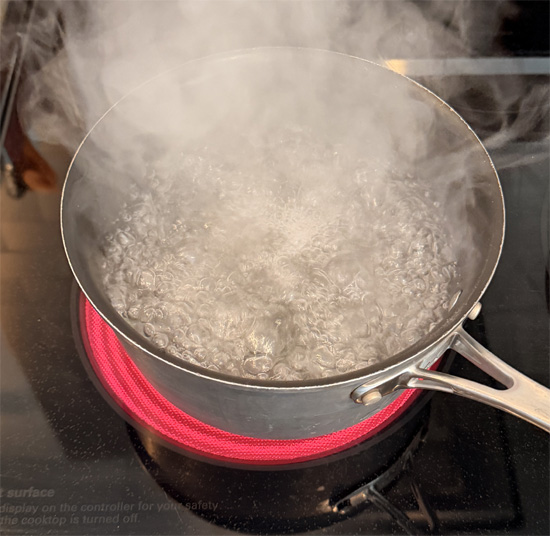 Fill a large pot with 2 qt. of water, about 8 cups, and set it over high heat to come to a boil.