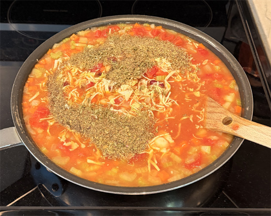 Stir in all the remaining ingredients EXCEPT macaroni. Bring to a boil, then reduce heat to low, cover and simmer for 16 minutes. 