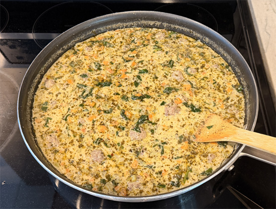 Turn the heat to low. Stir in the pesto, grated Parmesan, and lemon juice. Taste and adjust seasoning with additional salt, pepper, or red pepper flakes if desired. 