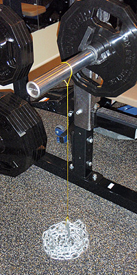 In this example we've used a string on the bar with a hook on the chain.