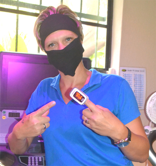 Martina Bevis wearing pulse oximeter.